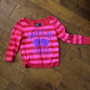 Women’s bright red and pink sweatshirt